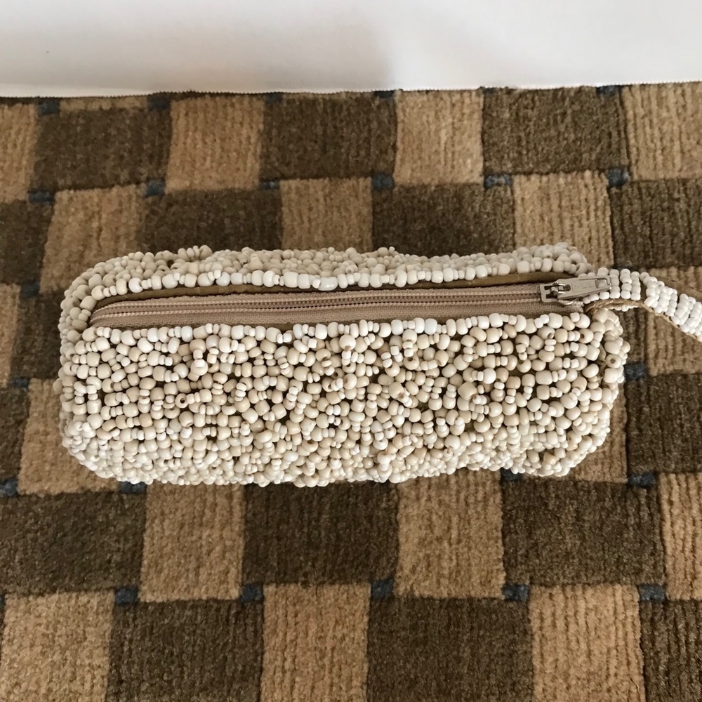 Adorable Beige Beaded Wristlet
